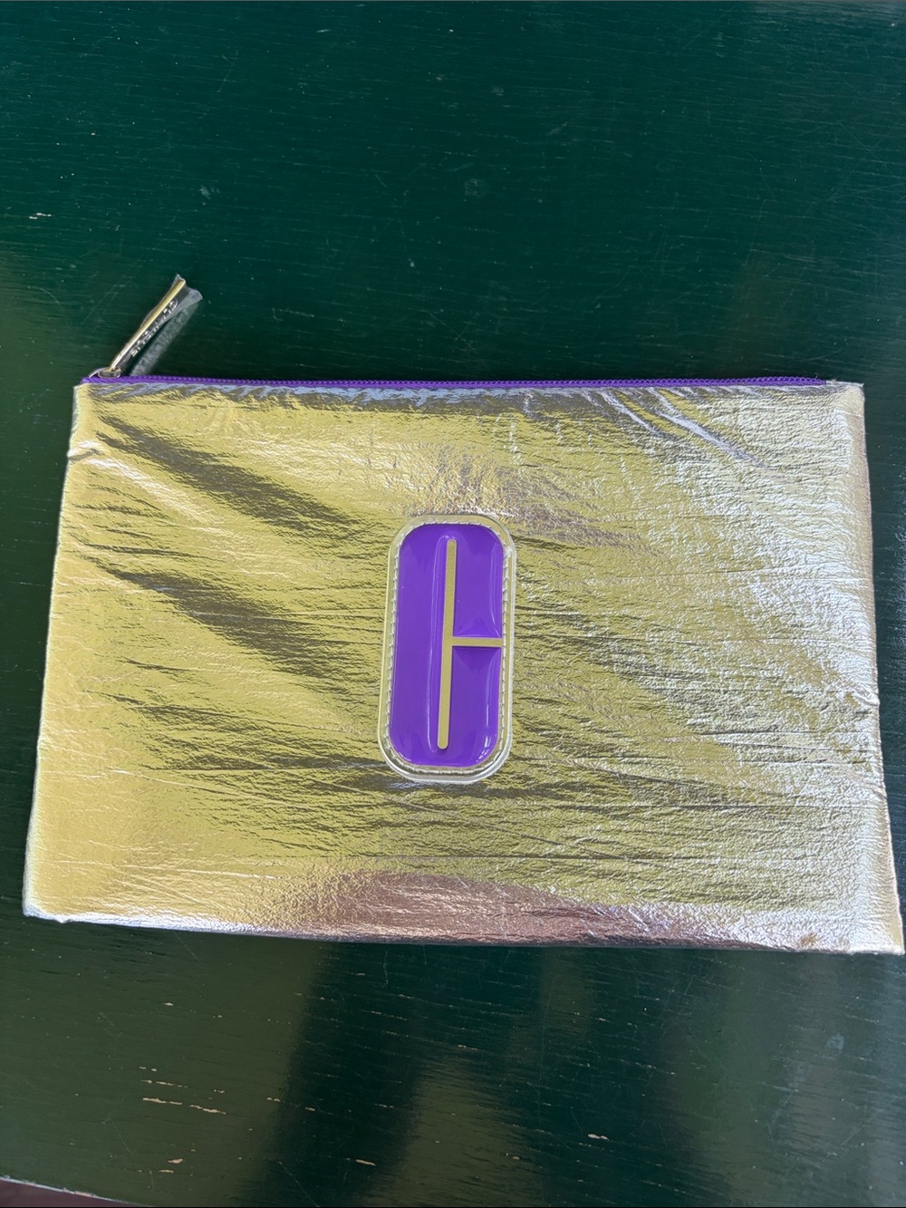 Clinique Silver Metallic Pouch with Purple Logo Accent
